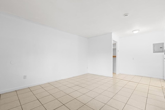 6 Arizona Ter Unit 2, Arlington, MA 02474 - spare room with electric panel, light tile patterned floors, and a smoke detector