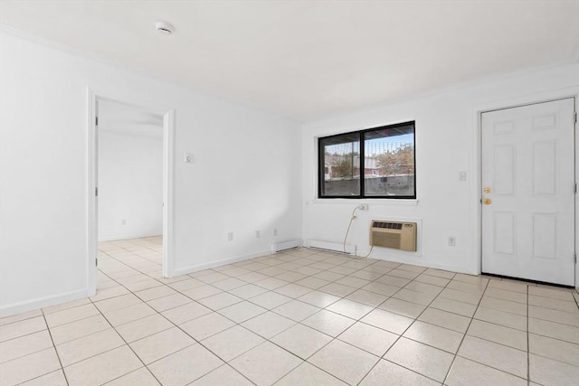 6 Arizona Ter Unit 2, Arlington, MA 02474 - empty room featuring an AC wall unit, light tile patterned floors, and a smoke detector