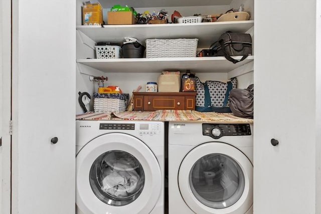 washroom with washing machine and dryer