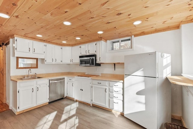 kitchen with stainless steel appliances, white cabinets, light hardwood / wood-style floors, and wood ceiling