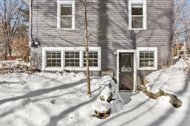 view of snow covered property