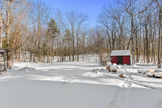 view of yard layered in snow