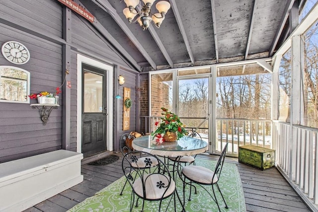 sunroom / solarium with lofted ceiling