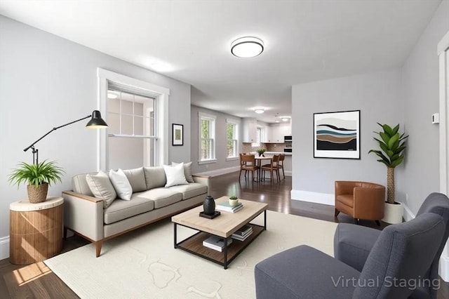 68 Putnam St, Weymouth, MA 02189 - living room with wood finished floors and baseboards