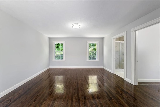 68 Putnam St, Weymouth, MA 02189 - unfurnished room featuring dark wood-style flooring and baseboards