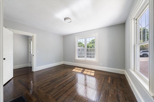 68 Putnam St, Weymouth, MA 02189 - empty room featuring baseboards and wood finished floors