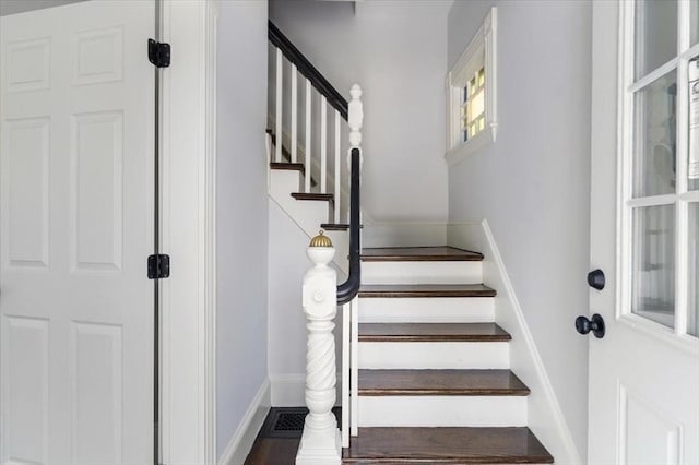 68 Putnam St, Weymouth, MA 02189 - stairway featuring baseboards
