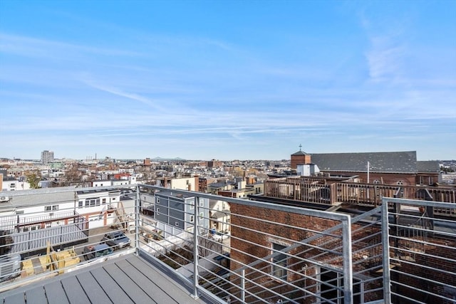 balcony featuring a city view