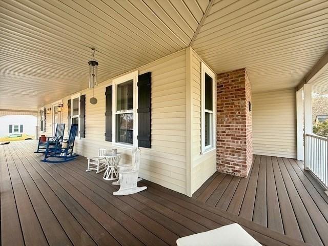 wooden terrace with covered porch