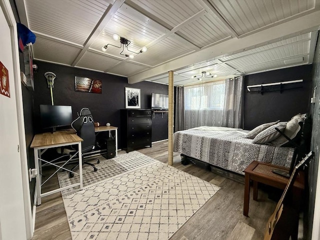 bedroom with wood finished floors