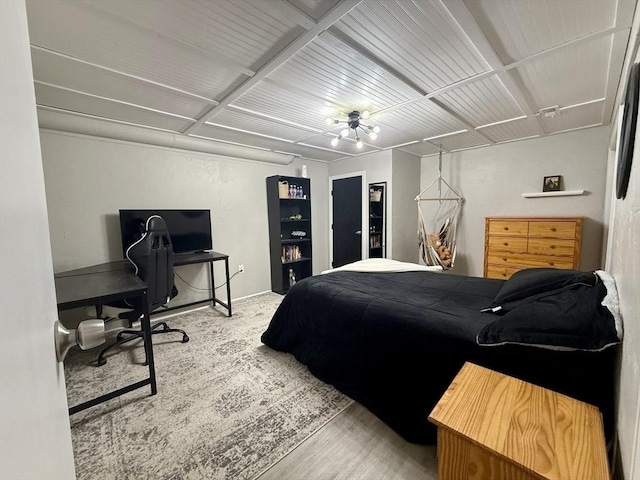 bedroom featuring wood finished floors