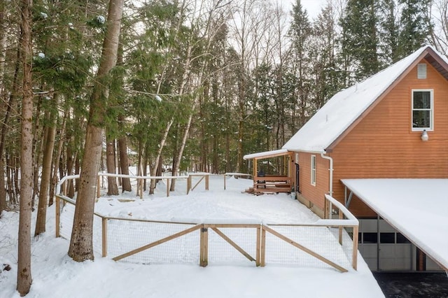 view of snow covered deck