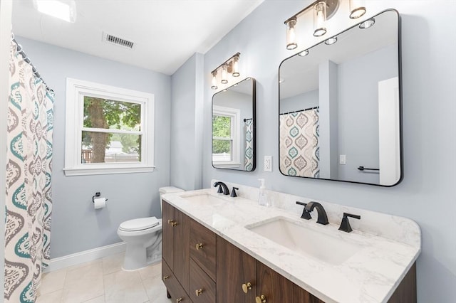 26 W Park St, Franklin, MA 02038 - full bath with double vanity and tile patterned flooring