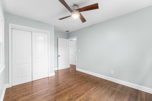 26 W Park St, Franklin, MA 02038 - unfurnished bedroom with wood finished floors, a closet, and a ceiling fan