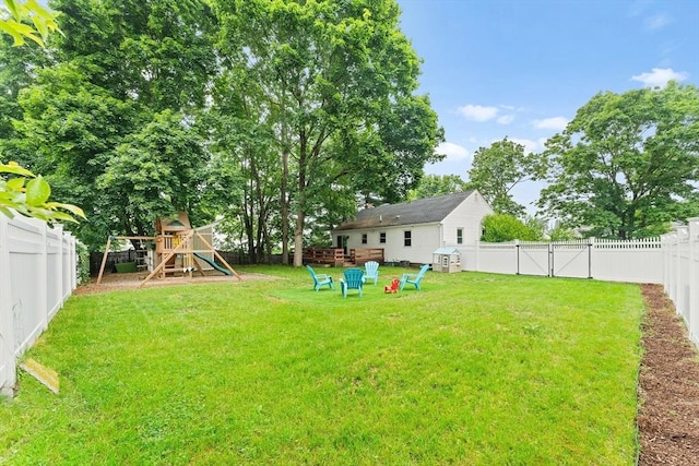 26 W Park St, Franklin, MA 02038 - fenced backyard with a playground