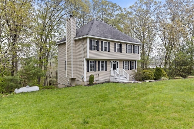 2240 Turnpike St, North Andover, MA 01845 - colonial-style house with a chimney and a front lawn