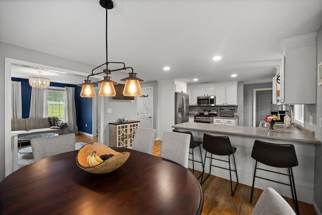 2240 Turnpike St, North Andover, MA 01845 - dining room with wood finished floors and recessed lighting