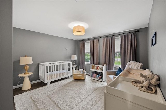 2240 Turnpike St, North Andover, MA 01845 - bedroom featuring baseboards and wood finished floors