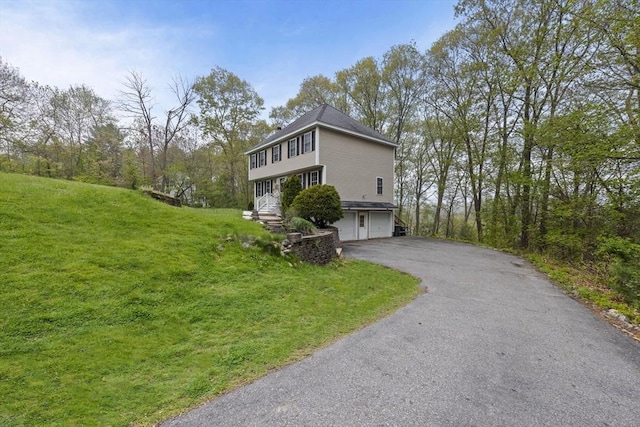 2240 Turnpike St, North Andover, MA 01845 - view of property exterior with a garage, driveway, and a lawn