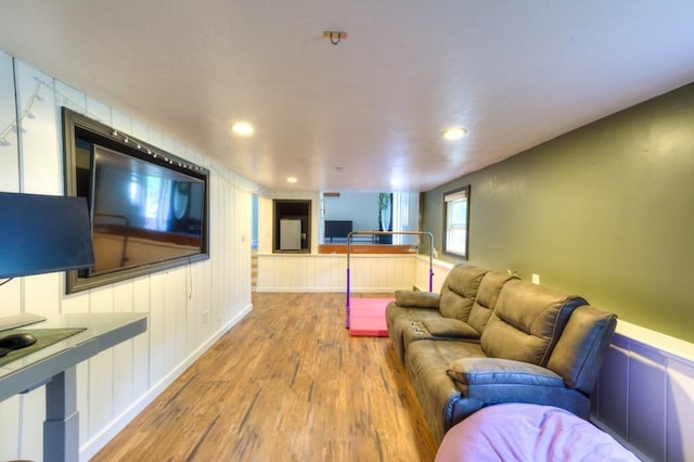 36 Winthrop St, West Boylston, MA 01583 - living room with wood finished floors, recessed lighting, and a wainscoted wall