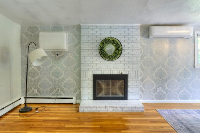 36 Winthrop St, West Boylston, MA 01583 - detailed view of an AC wall unit, wood finished floors, wallpapered walls, baseboard heating, and baseboards