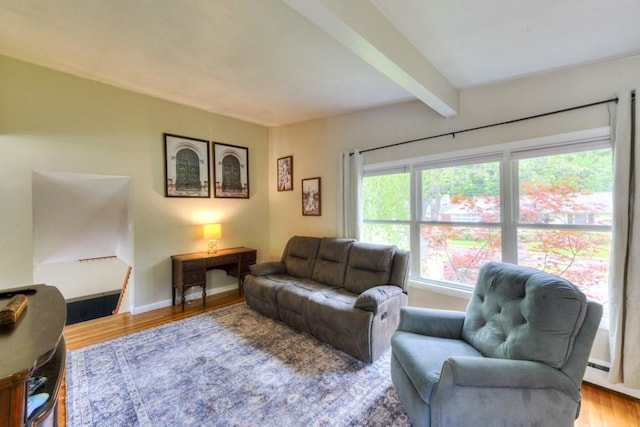 36 Winthrop St, West Boylston, MA 01583 - living room with beamed ceiling, wood finished floors, baseboards, and baseboard heating