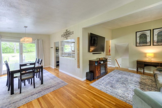 36 Winthrop St, West Boylston, MA 01583 - dining space with light wood finished floors and baseboards