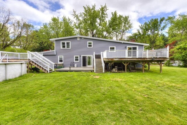 36 Winthrop St, West Boylston, MA 01583 - rear view of property featuring stairway, a deck, a yard, and a chimney