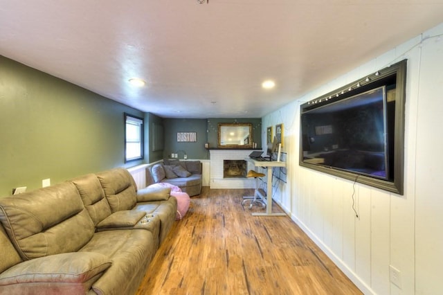 36 Winthrop St, West Boylston, MA 01583 - living room with a brick fireplace, wood finished floors, and recessed lighting