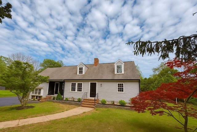 368 King St, Hanover, MA 02339 - new england style home featuring a front yard and a chimney