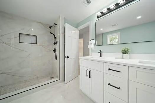 368 King St, Hanover, MA 02339 - full bathroom with a marble finish shower, double vanity, and marble finish flooring