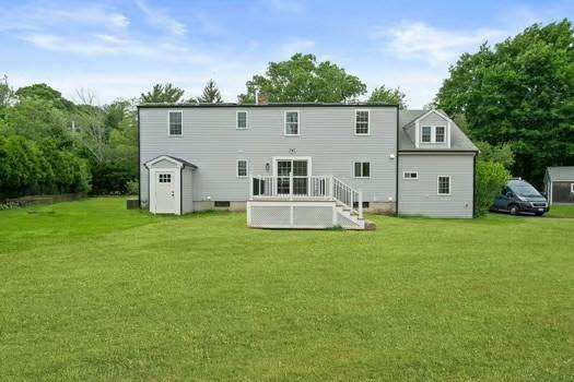 368 King St, Hanover, MA 02339 - back of property featuring a yard and a deck