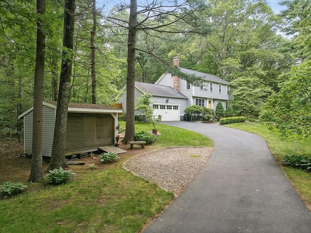 5 Coburn Rd, Hopkinton, MA 01748 - view of front of home with driveway and an attached garage