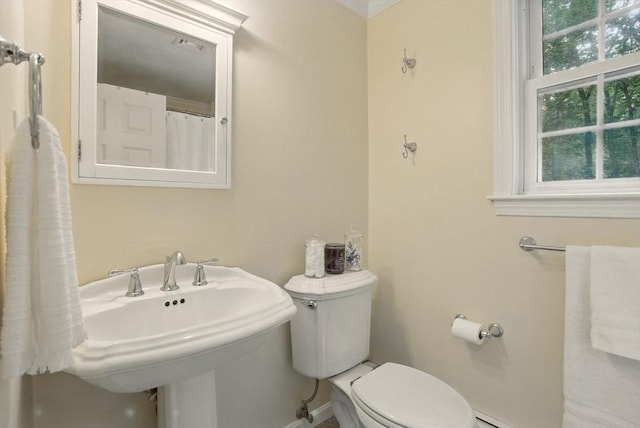5 Coburn Rd, Hopkinton, MA 01748 - bathroom featuring toilet, baseboard heating, baseboards, and a sink