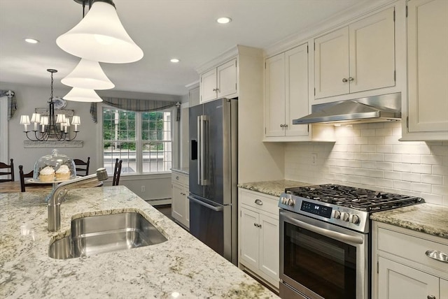 5 Coburn Rd, Hopkinton, MA 01748 - kitchen featuring appliances with stainless steel finishes, range hood, a sink, decorative backsplash, and a baseboard heating unit