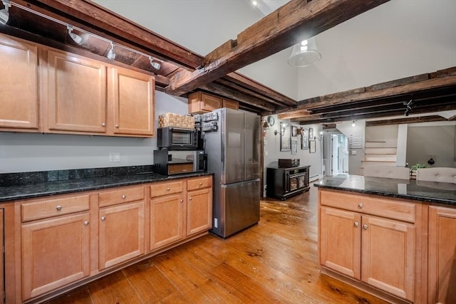 43 Mill Rd, North Andover, MA 01845 - kitchen featuring freestanding refrigerator, wood-type flooring, and dark stone counters
