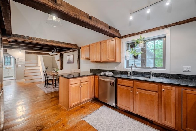 43 Mill Rd, North Andover, MA 01845 - kitchen with dishwasher, a peninsula, dark stone counters, and light wood-style floors