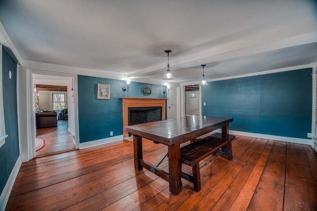 43 Mill Rd, North Andover, MA 01845 - dining space with a fireplace and hardwood / wood-style flooring