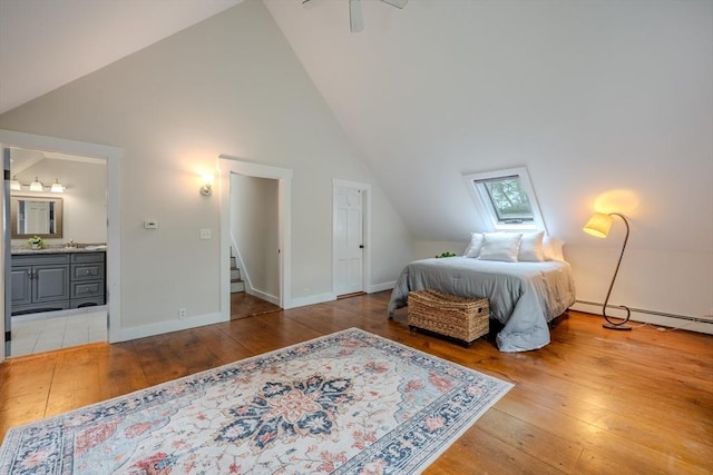 43 Mill Rd, North Andover, MA 01845 - bedroom with hardwood / wood-style flooring, ensuite bath, and high vaulted ceiling