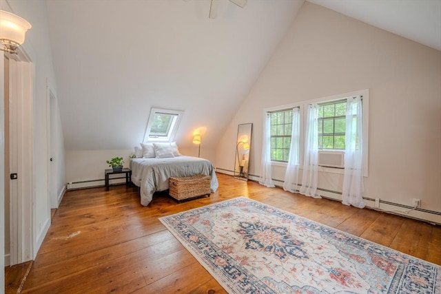 43 Mill Rd, North Andover, MA 01845 - bedroom with a baseboard radiator, wood-type flooring, and high vaulted ceiling