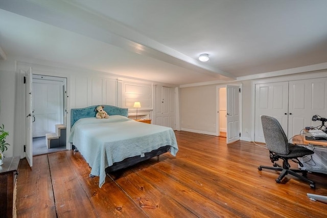 43 Mill Rd, North Andover, MA 01845 - bedroom with wood finished floors, an office area, and a closet
