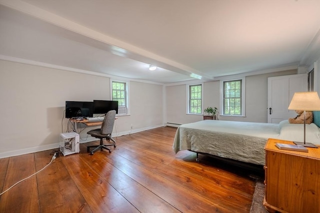 43 Mill Rd, North Andover, MA 01845 - bedroom featuring hardwood / wood-style flooring, a baseboard heating unit, and a desk