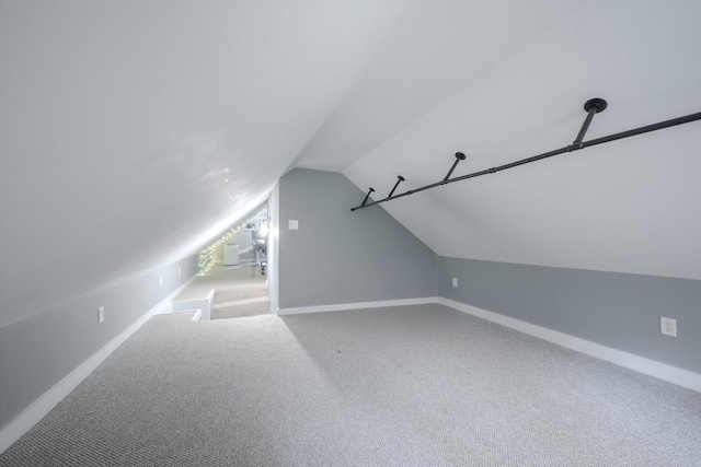 43 Mill Rd, North Andover, MA 01845 - additional living space with vaulted ceiling and carpet floors