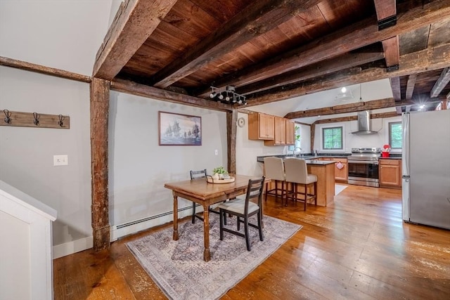 43 Mill Rd, North Andover, MA 01845 - dining space with baseboard heating, a wooden ceiling with exposed beams, and light wood finished floors