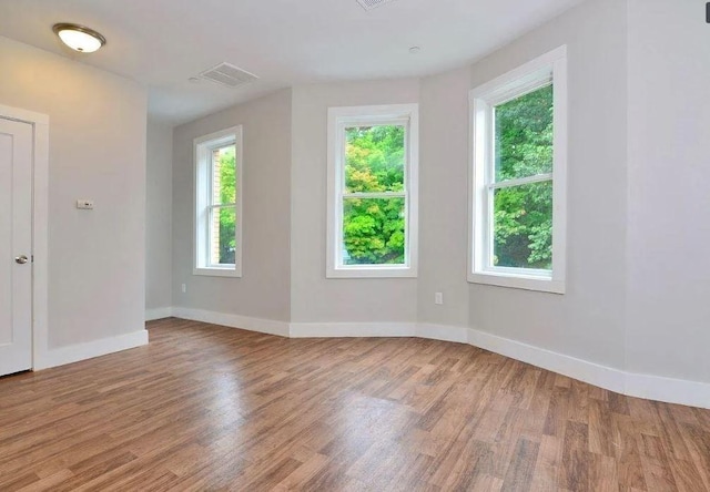 225 Washington, Boston, MA 02121 - spare room with wood finished floors and baseboards