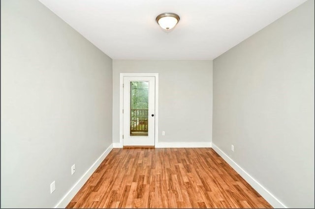 225 Washington, Boston, MA 02121 - spare room featuring baseboards and light wood finished floors