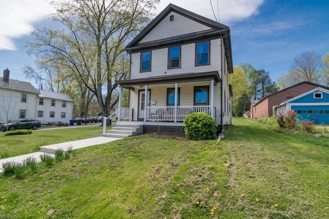 view of front of home featuring covered porch and a front yard