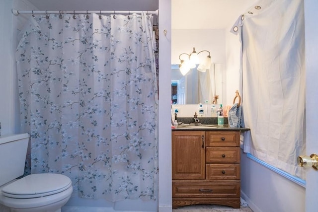 bathroom with toilet, a shower with shower curtain, and vanity