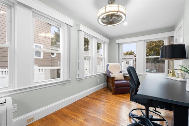 home office featuring light wood-style floors and baseboards