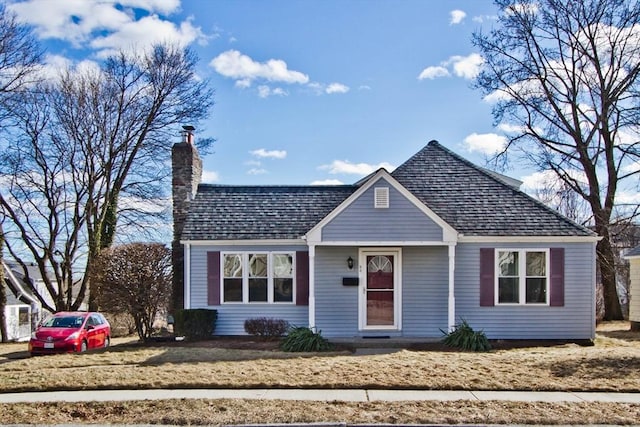 view of front of property with a chimney